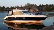 Aquador 23 HT med "norskeknappar" på taket